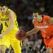 Michigan freshman Mitch McGary eyes the ball as Syracuse sophomore Michael Carter-Williams moves it down the court in the first half in the Final Four in Atlanta on Saturday, April 6, 2013. Melanie Maxwell I AnnArbor.com